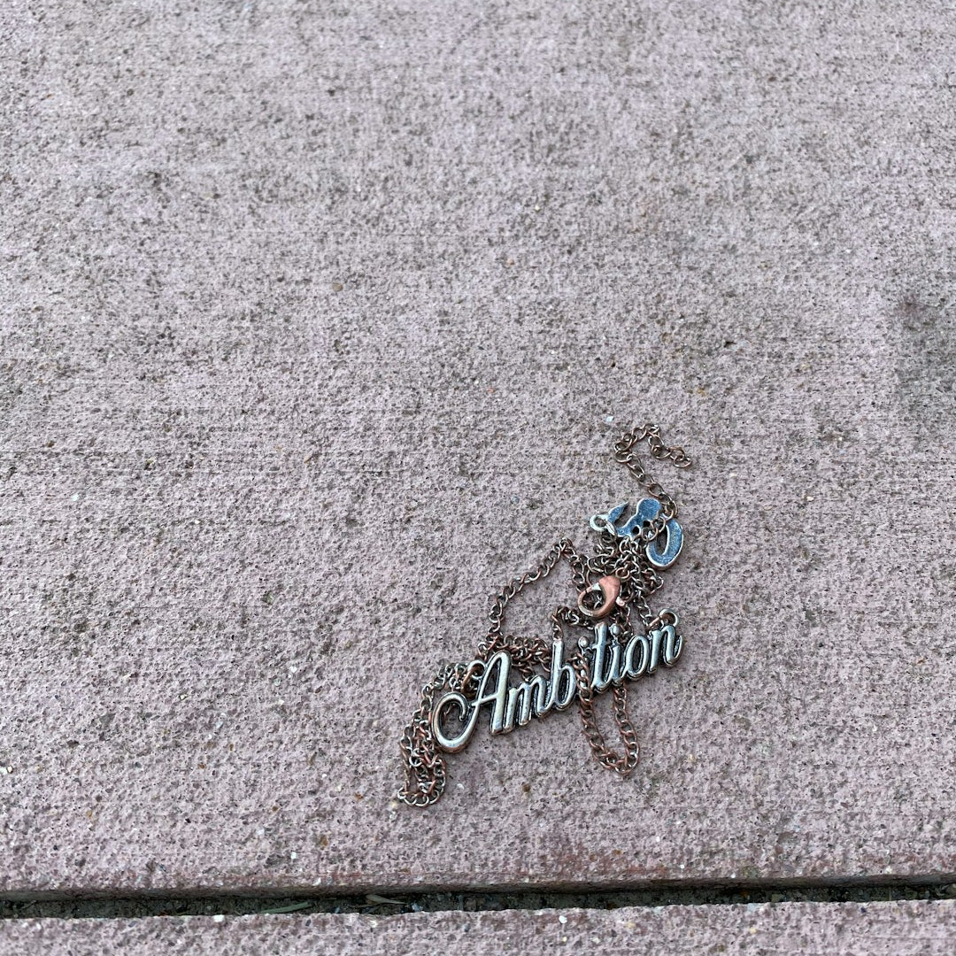 How to Design Your Own Custom Jewelry: Tips for Creating the Perfect Name Plate Necklace