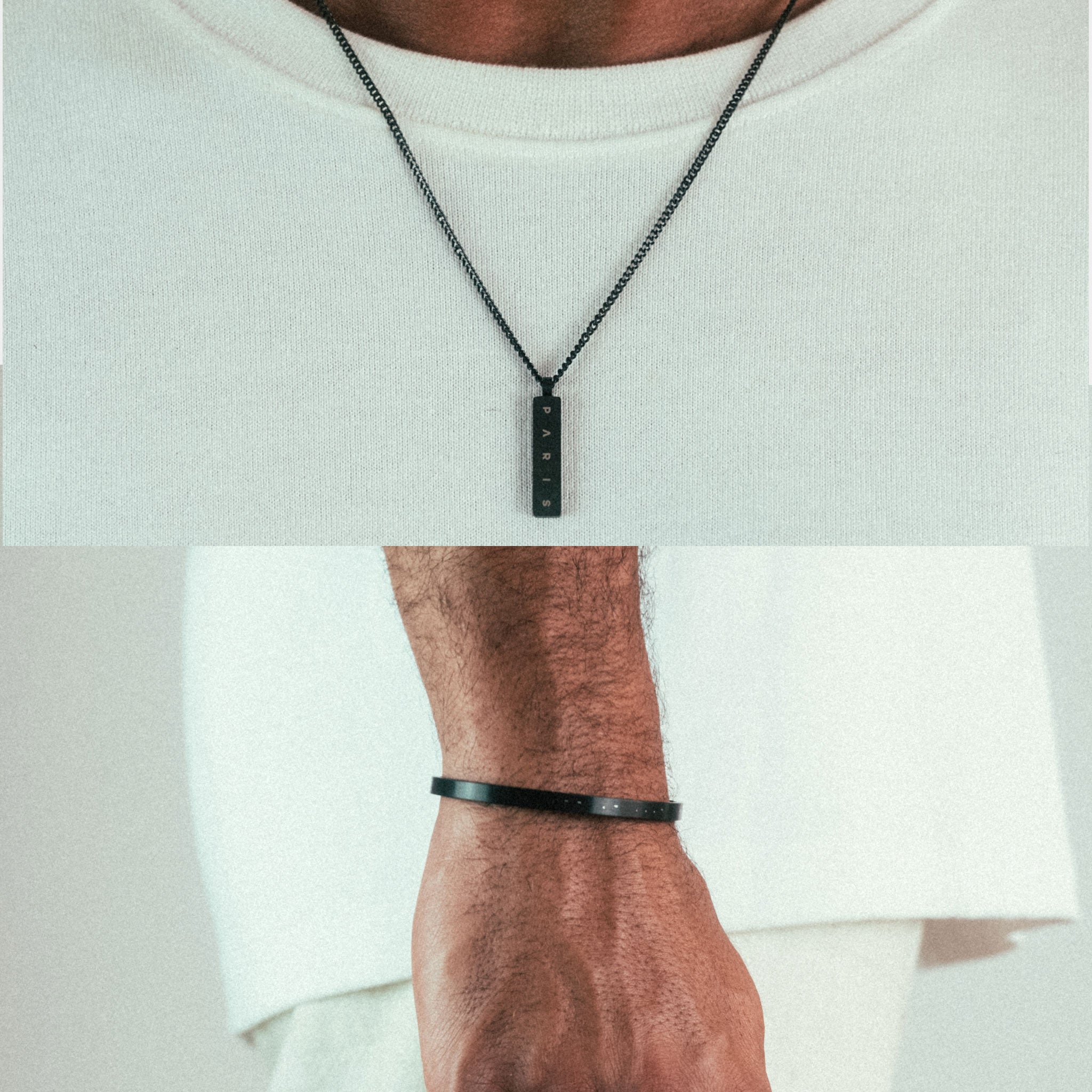 A person wearing the WAV Custom Cuff + Necklace Bundle with a sleek bracelet and black rectangular pendant necklace adorned with symbols. These pieces perfectly complement their white textured shirt.
