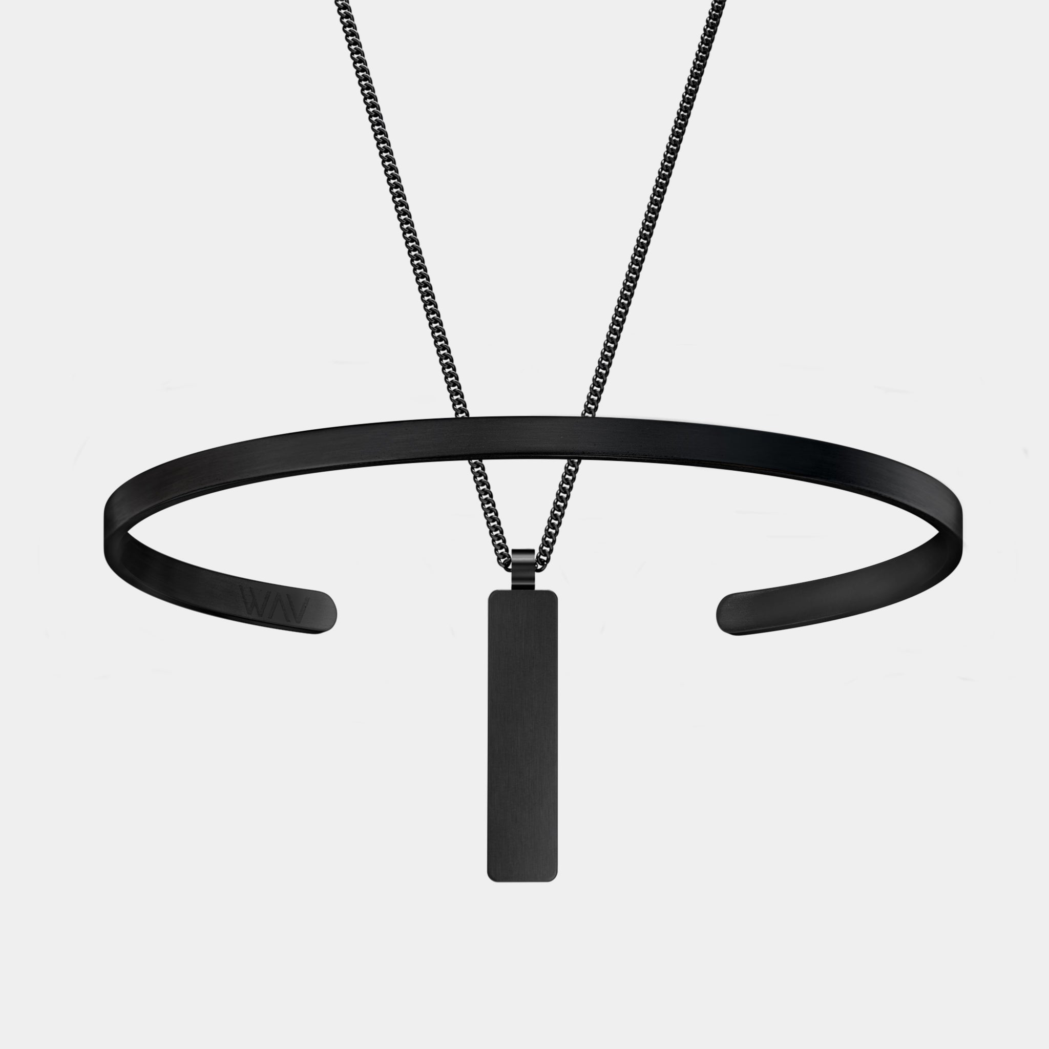 The WAV Custom Cuff + Necklace Bundle features a minimalist black metal choker with an open circular design and a sleek rectangular pendant. This modern jewelry piece embodies style and elegance, making it the perfect gift.