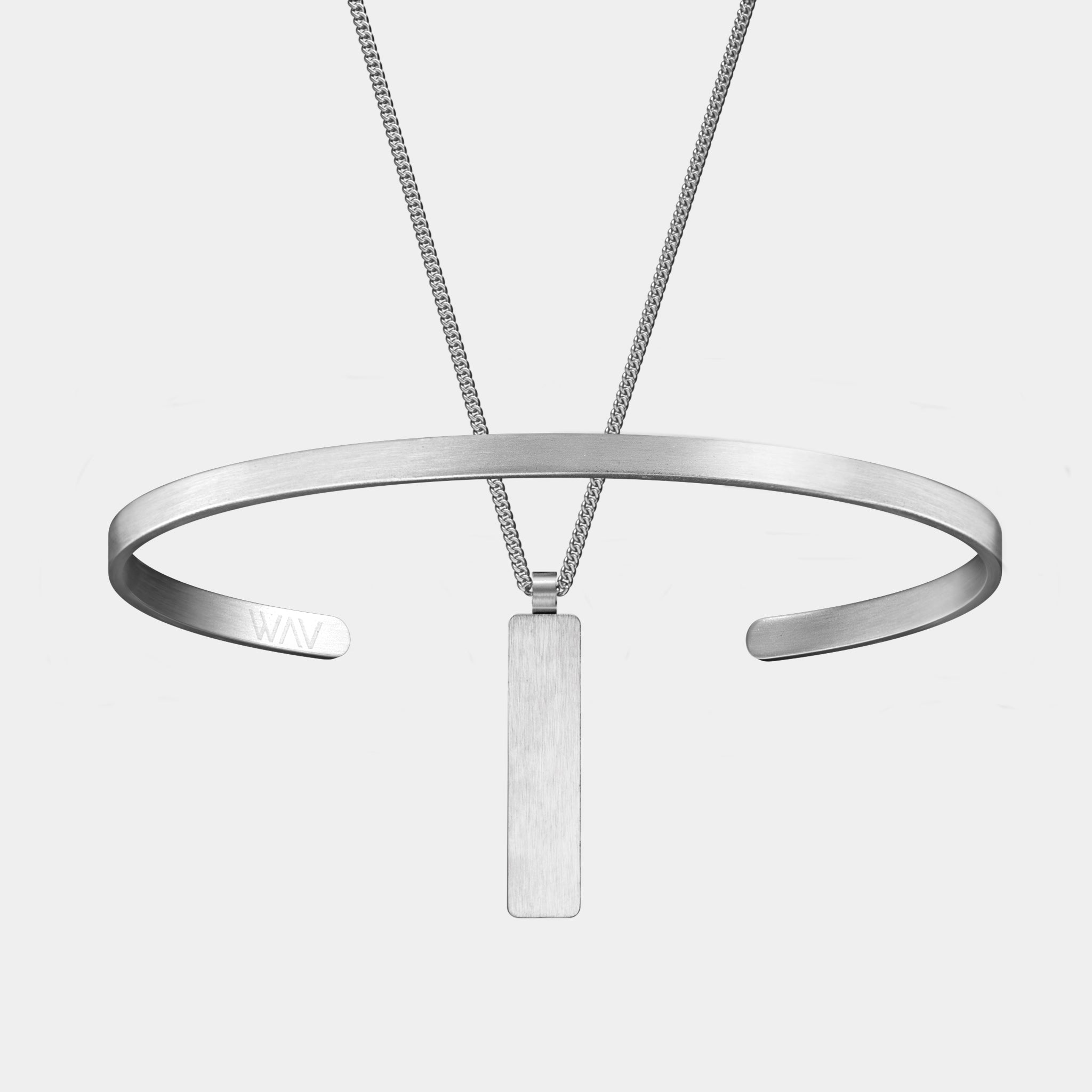 The WAV Custom Cuff + Necklace Bundle includes a silver rectangular pendant necklace on a thin chain and an open bangle with WAV embossed, set against a light gray background.