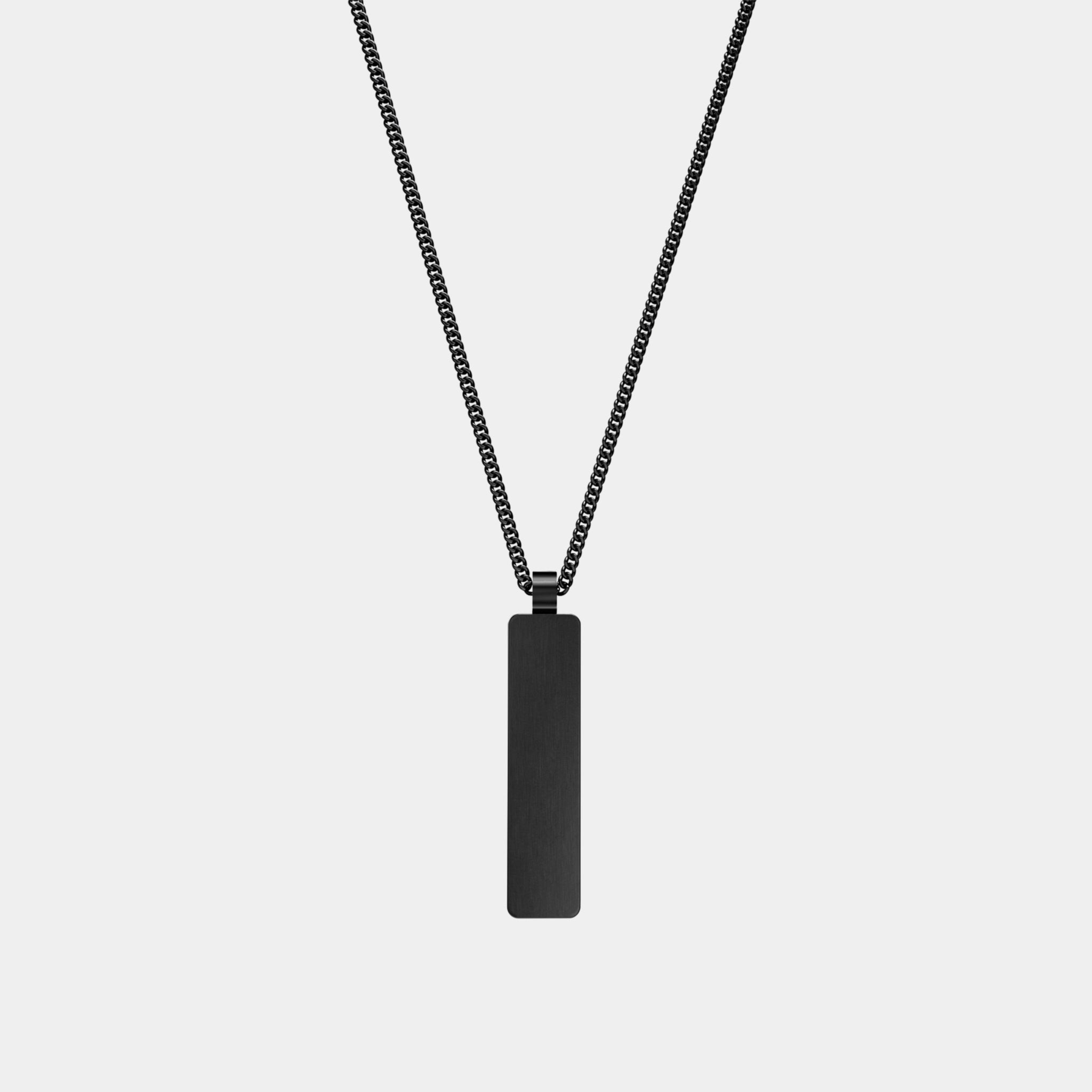 The WAV Custom Necklace Bar features a black rectangular pendant with a sleek, matte finish on a matching black chain. Photographed against a plain white background, this minimalist piece is the perfect elegant jewelry gift, hanging vertically and boasting an understated design.