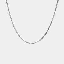The WAV Cuban Chain Necklace, a personalized jewelry piece, features a delicate silver chain with small interlocking links forming an elegant curve, beautifully displayed against a plain white background.